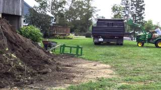 loading dirt with the John Deere 1026R [upl. by Ternan]