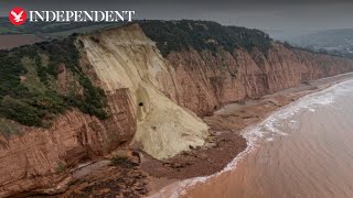 Cottage left teetering on the brink of 400ft drop after Jurassic Coast cliff fall [upl. by Katt]