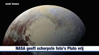 NASA geeft scherpste fotos Pluto vrij [upl. by Lapointe]