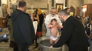 Watch 500 babies baptised in Georgian mass ceremony [upl. by Benis]