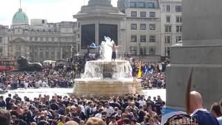 Scottish fans on the fountain in Trafalgar Square [upl. by Nylsirhc749]