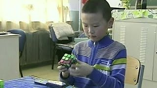 9 YEAR OLD BOY SOLVES RUBIKS CUBE IN 1184 SECONDS  BBC NEWS [upl. by Trill249]