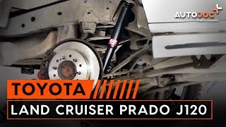 Hoe een schokbreker achteraan vervangen op een TOYOTA LAND CRUISER PRADO J120 HANDLEIDING  AUTODOC [upl. by Chace]