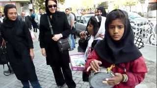 IranYoung girl singing in front of Jomeh BazarTehran2011 [upl. by Standush]