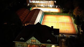 Le Dieweg Fitness amp Sports Center  All weather tennis by night [upl. by Suoicerpal237]