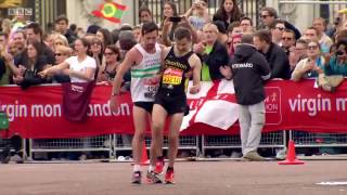 AMAZING FOOTAGE London Marathon Runner Helps Exhausted Competitor Over Finish Line [upl. by Stannwood]