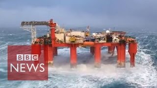 Huge waves crash against swaying North Sea oil rig [upl. by Wiltshire420]