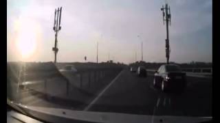 Motorcyclist crash and perfectly lands on a cars roof [upl. by Etiam222]