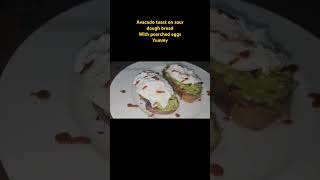 Avacado toast on sour dough bread with pached eggs the best breakfast especially made by someone [upl. by Htur]