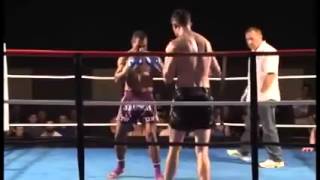 Papua New Guinean Kickboxer spin kicks a much taller opponent to sleep knock out [upl. by Greenwood]