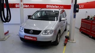 VW CaddyTouran Hvordan bytte støtdempere fjærer og fjærbenslager foran  2004 til 2010 mod 2K [upl. by Apple743]