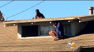 Woman Hides From Mentally Ill Intruder On Roof [upl. by Seaver]