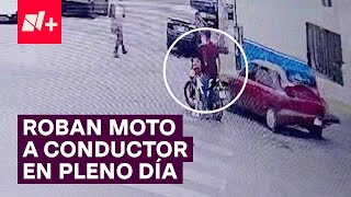 A punta de pistola pandilla roban motocicleta a conductor a plena luz del día  N [upl. by Donni281]