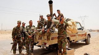 Iraqi Kurdish forces take Kirkuk repel Islamic militants [upl. by Ardnoik]