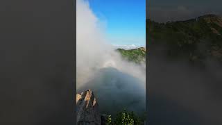 2720 Chinese man witnesses “Buddhas light” and rainbows atop Wushan [upl. by Einad]