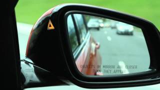 Active Blind Spot Detection  BMW HowTo [upl. by Akeemahs573]