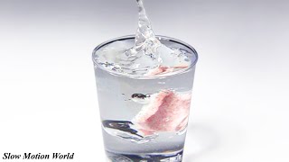 Effervescent tablet in water Slow Motion World [upl. by Ahsitram]