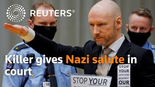 Norwegian killer Breivik gives Nazi salute at parole hearing [upl. by Llenehs]