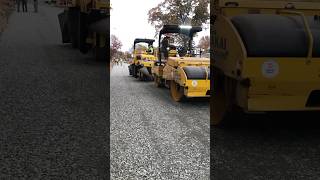 Using vibrating tire roller on dense course stone base in Catskills construction asphalt paving [upl. by Eillak936]