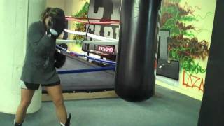 How to Punch the heavy bag for women [upl. by Hsara]