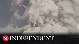 Tonga volcano eruption fills sky with black ash clouds [upl. by Ylatfen630]