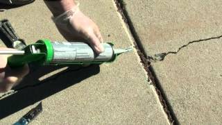 How to Fix a Crack in a Driveway [upl. by Assilav]