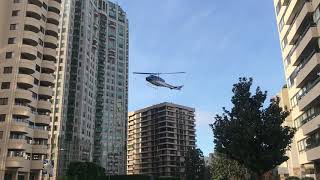 HELICOPTER LIFTING ON WILSHIRE BLVD IN LOS ANGELES WITH A BELL 205 N78EC [upl. by Iglesias189]