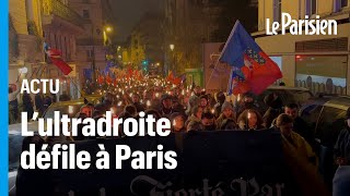 500 identitaires défilent aux flambeaux à Paris [upl. by Thaxter]