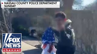 Migrant beats resident steals flag from NY home [upl. by Ecinnej996]