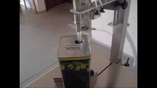 Riempitrice semiautomatica per olio  Volumetric Filler for edible oil [upl. by Beka]