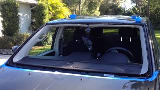 How to install windshield on a 2012 Chrysler Town and Country with the Rolladeck [upl. by Anawat]