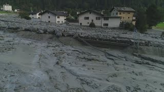 A landslide has left a path of destruction through a small Swiss town [upl. by Anilasor]