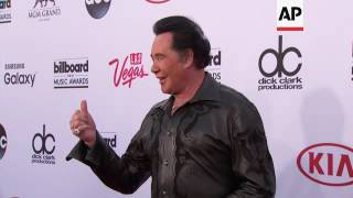 Singer Wayne Newton and wife Kathleen McCrone arrive at the Billboard Music Awards in Las Vegas [upl. by Lati]