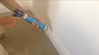 How to caulk fill Skirting boards gun fill [upl. by Ynnos246]