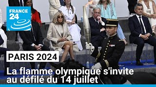 Paris 2024  la flamme olympique sinvite aux festivités du 14 juillet dans la capitale [upl. by Boffa584]