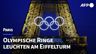 Olympische Ringe leuchten am Eiffelturm  AFP [upl. by Ecad]