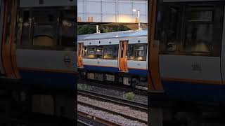 378255 arriving at Kensington Olympia with a London Overground service to Clapham Junction train [upl. by Ymot]