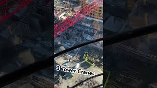 3 Tower cranes on commercial construction site Tight grouping potain tower cranes [upl. by Kaule]