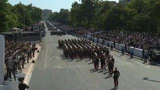 Début du défilé du 14 juillet à Paris  AFP Images [upl. by Akimahs828]