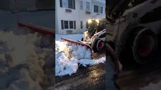 Pushing snow with the Bobcat S570 [upl. by Aihsot480]