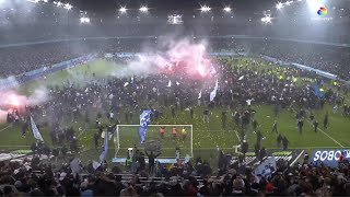 Malmo fans storm pitch and mob players with flares and fireworks after winning league [upl. by Hsaka]