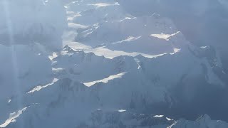 Italian and Swiss alps covered in snow in November from 36000 feet [upl. by Orland]