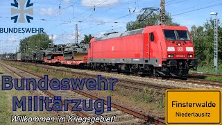 Bundeswehr Militärzug am 18072024 in Finsterwalde DB Cargo 185 346 mit Panzer Trucks nach Polen [upl. by Ellenrahc]