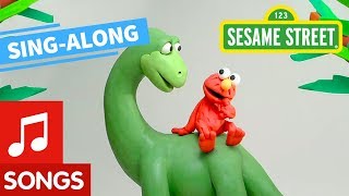 Sesame Street Elmos Dinosaur Song Lyric Video  Elmos Sing Along Series [upl. by Harmony]