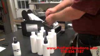 Dispensamatic Bottlematic 10 Round Label Applicator [upl. by Tingey]