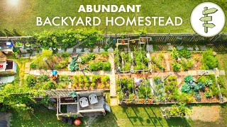 Couples Amazing Backyard Homestead Produces TONS of Food in the City  FULL GARDEN TOUR [upl. by Naloj330]