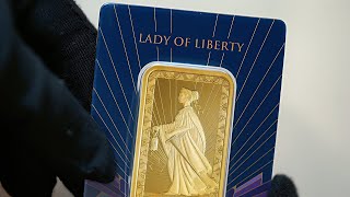 1 oz PAMPNewmont Lady of Liberty Gold Bar in Assay [upl. by Enilraep370]