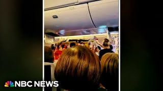 Flight makes emergency landing after severe turbulence injures at least 30 [upl. by Eelarbed]