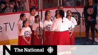 O Canada performed in Ojibway at Jets game [upl. by Enois]