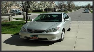 How to replace the headlight bulbs on our car a Toyota Camry [upl. by Aneeres610]